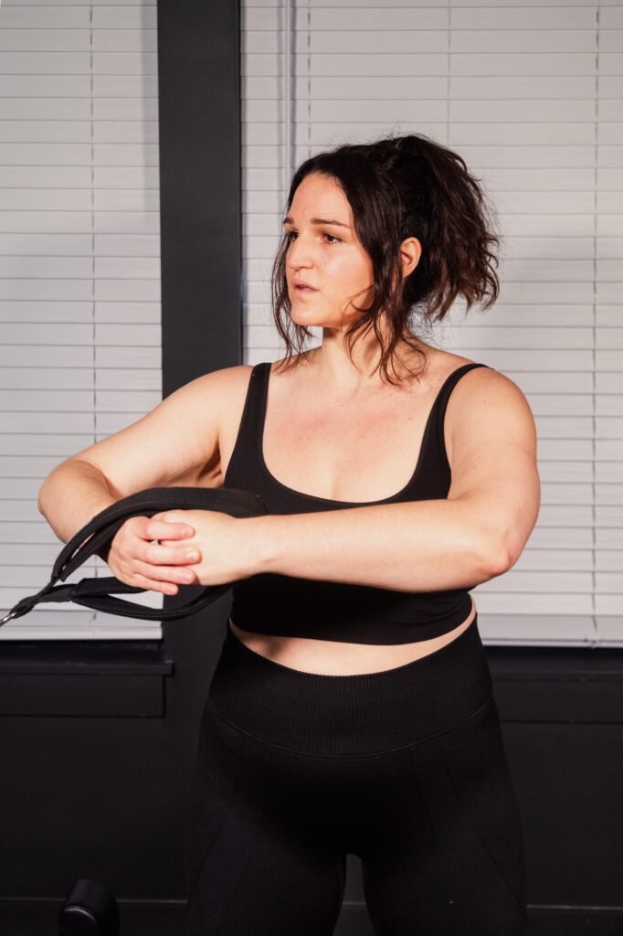 Woman doing Pilates exercise. 